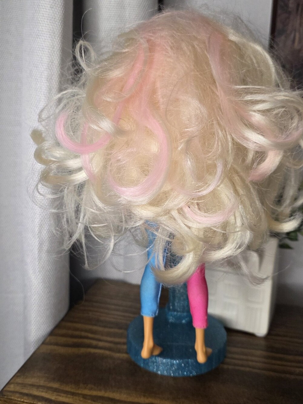 Doll brittany with blue, pink, and beige color-blocked outfit